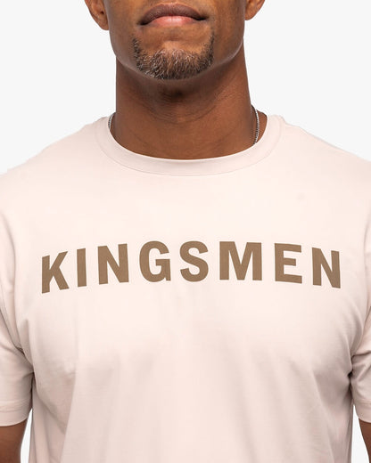 Kingsmen Golf Legacy Crewneck T-Shirt oatmeal on person front zoomed
