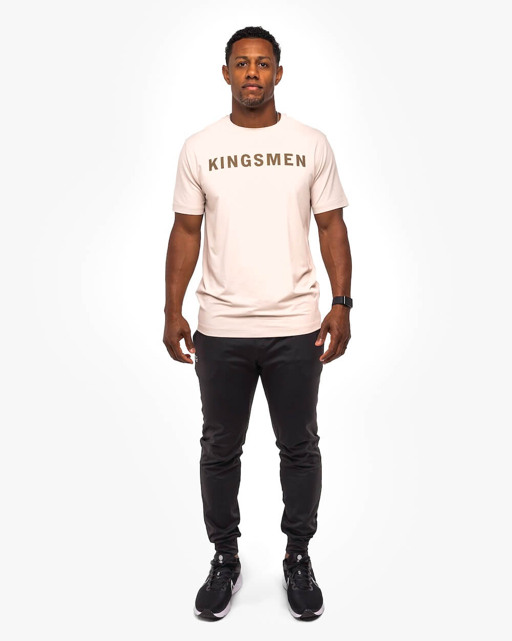 Kingsmen Golf Legacy Crewneck T-Shirt oatmeal on person front full view